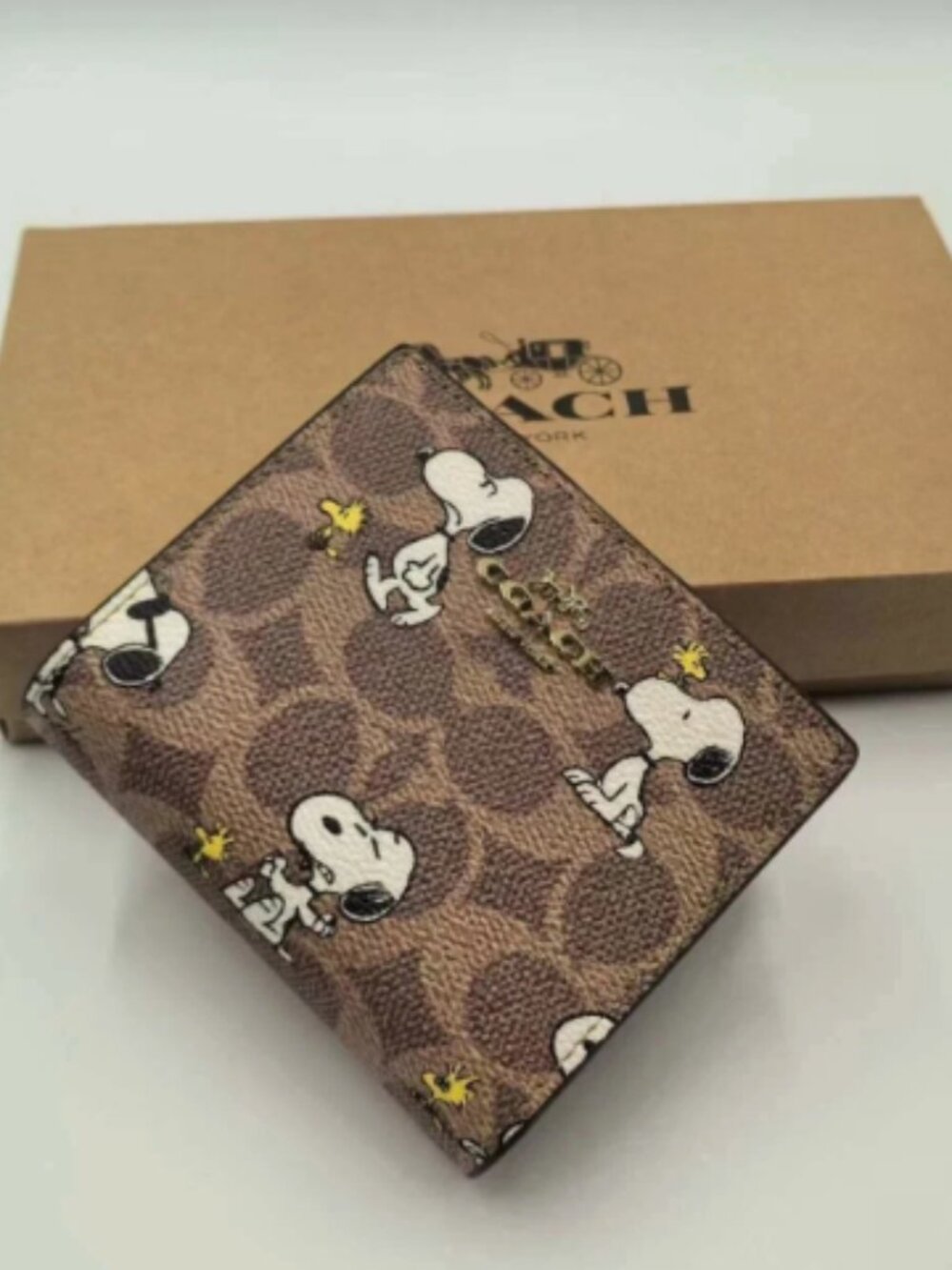 Coach X Peanuts Snap Wallet In Signature Canvas With Snoopy Print CBN32